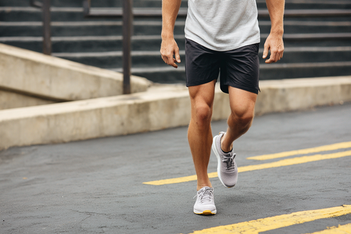 jay081480_77365_a_cropped_view_of_a_man_walking_outdoors_focusi_fdcbdd29-aae5-459f-b331-2035b9e41569.png