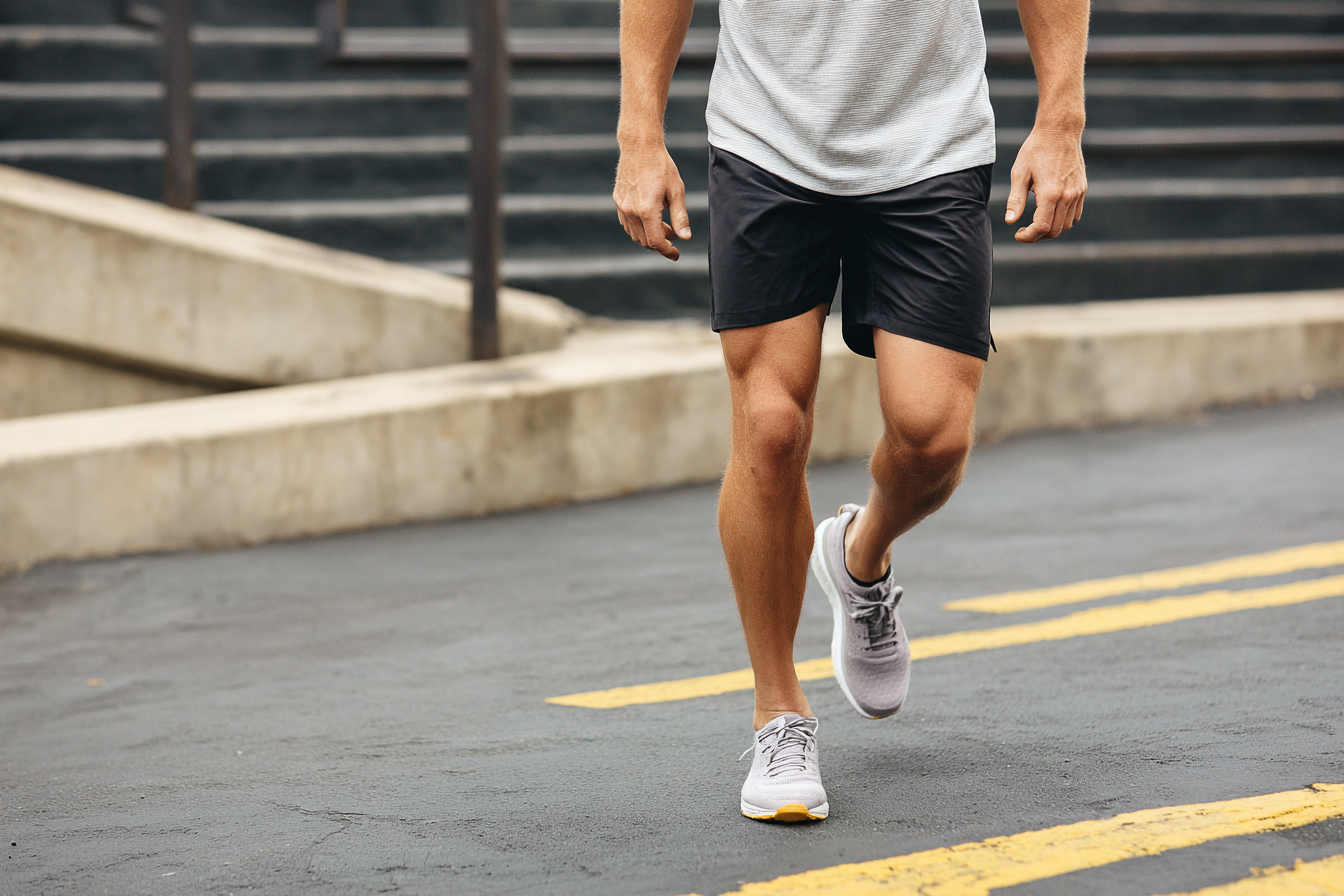 jay081480_77365_a_cropped_view_of_a_man_walking_outdoors_focusi_fdcbdd29-aae5-459f-b331-2035b9e41569