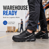 Worker wearing L-7601 black lightweight safety shoes in a warehouse